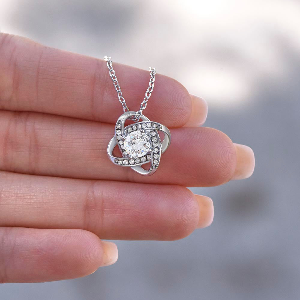 "She cried when she opened the box and read this." Love Knot Necklace.